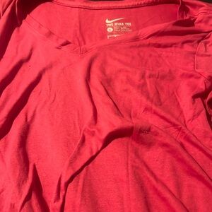 Pink colored Nike tee size large
